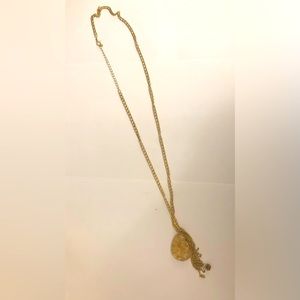 Long gold necklace